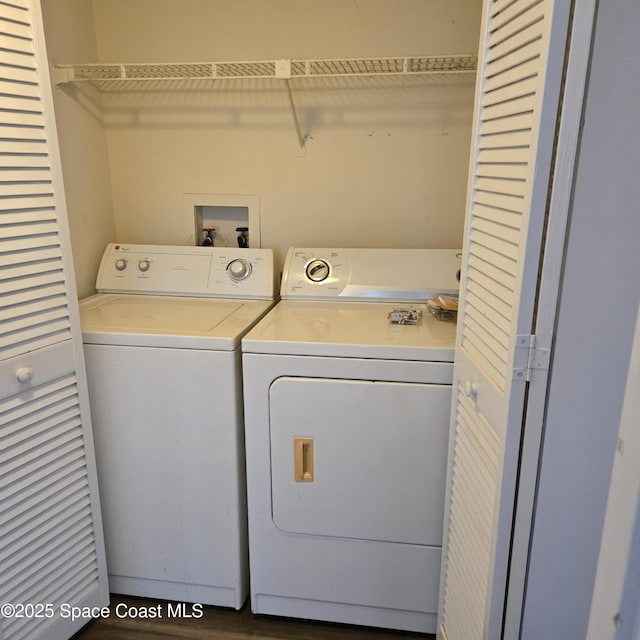 laundry room featuring washer and clothes dryer