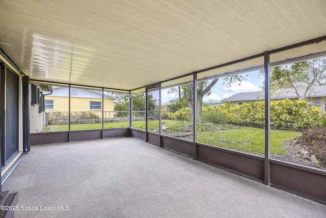 unfurnished sunroom featuring a healthy amount of sunlight