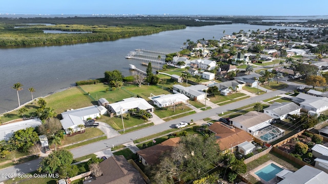 drone / aerial view with a water view