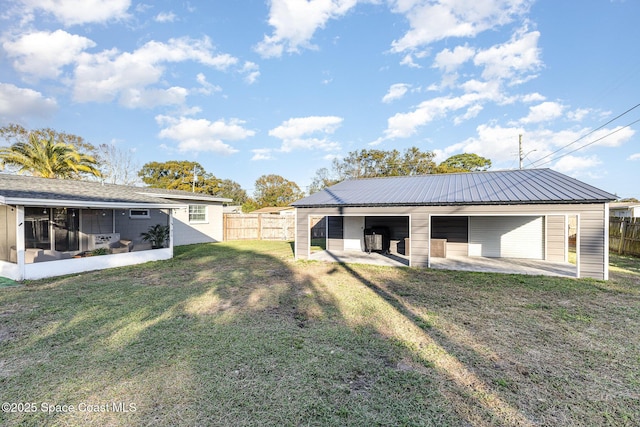 exterior space featuring a sunroom and a patio area