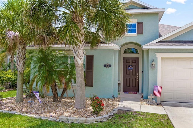 property entrance with a garage