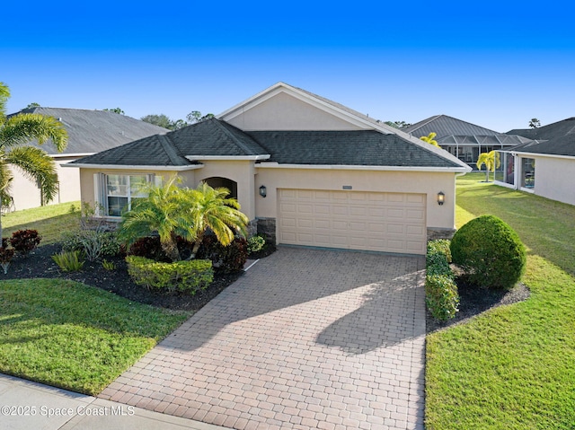 3804 Sansome Cir, Melbourne, FL 32940 - ranch-style home with a garage, a front yard, stucco siding, and decorative driveway