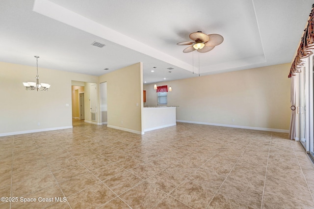 3804 Sansome Cir, Melbourne, FL 32940 - unfurnished living room with a raised ceiling, visible vents, light tile patterned flooring, baseboards, and ceiling fan with notable chandelier