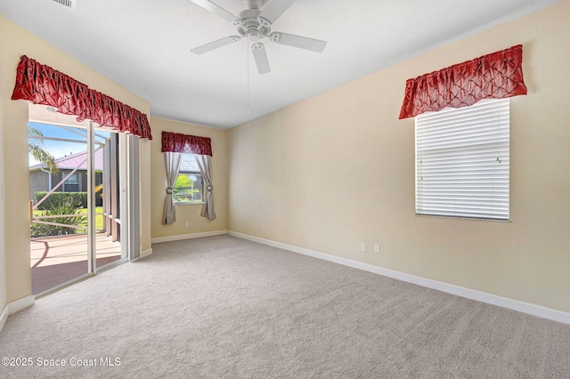 3804 Sansome Cir, Melbourne, FL 32940 - spare room featuring carpet floors, a ceiling fan, and baseboards