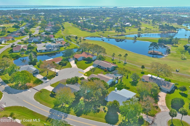 bird's eye view with a residential view, a water view, and golf course view