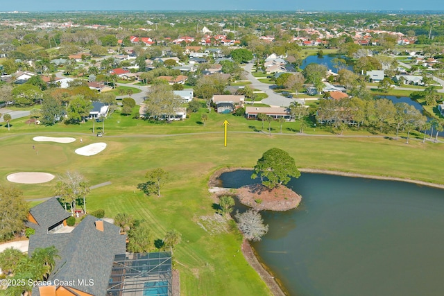 bird's eye view with a residential view, view of golf course, and a water view