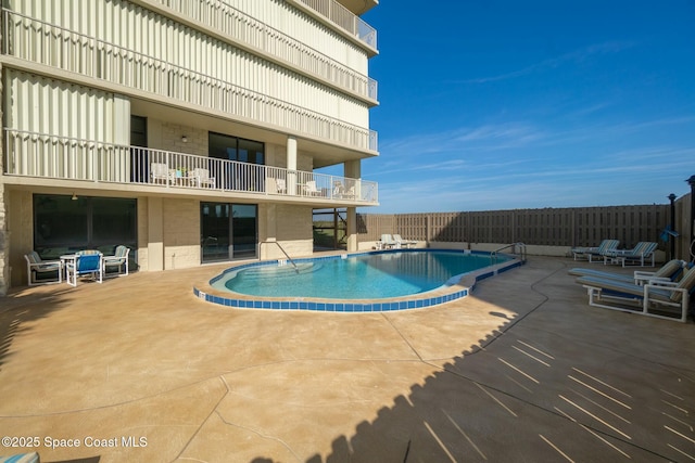 view of pool with a patio area