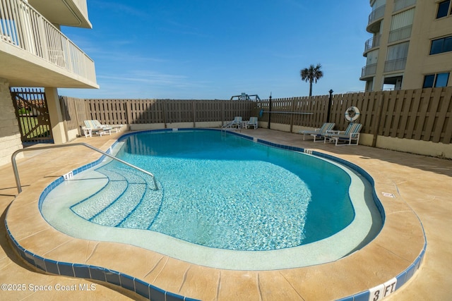 view of pool with a patio