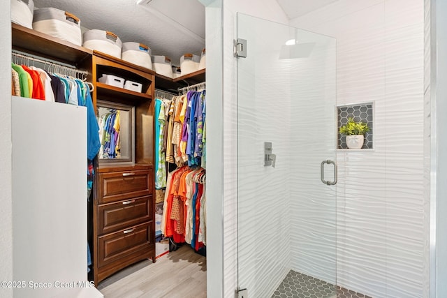 spacious closet with light wood-type flooring