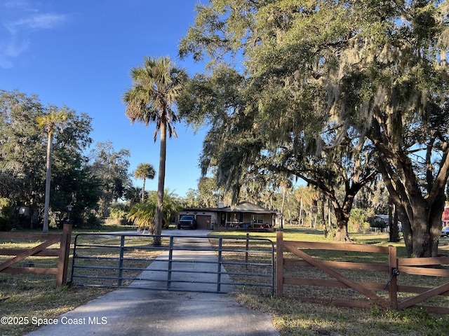 view of gate with fence