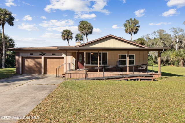 single story home featuring concrete driveway, a porch, a front lawn, and an attached garage