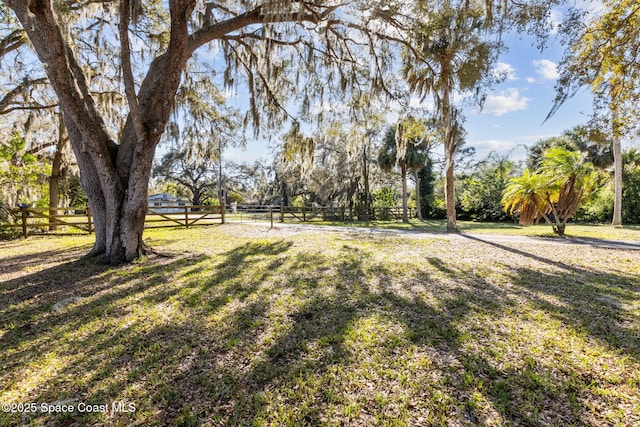 view of yard featuring fence