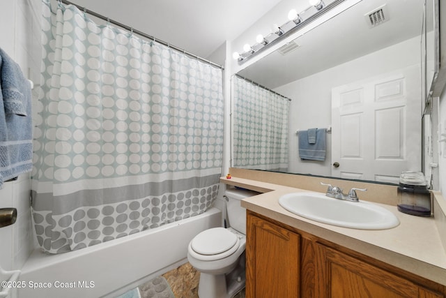 full bathroom featuring vanity, toilet, and shower / tub combo