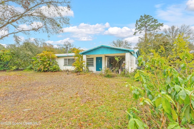 view of front of home featuring covered porch