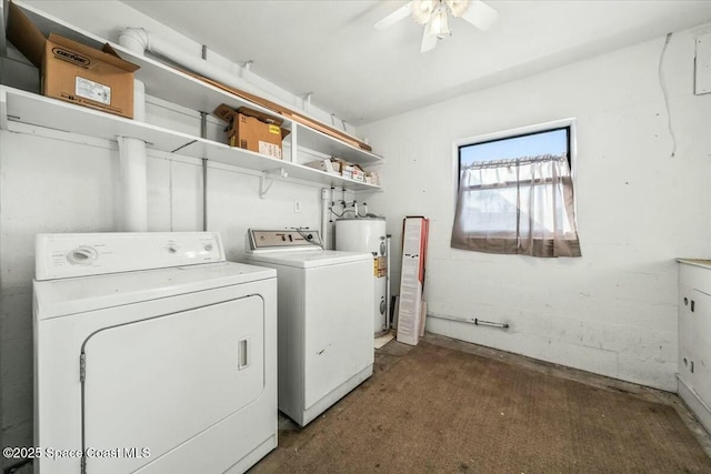 clothes washing area with separate washer and dryer, water heater, and ceiling fan