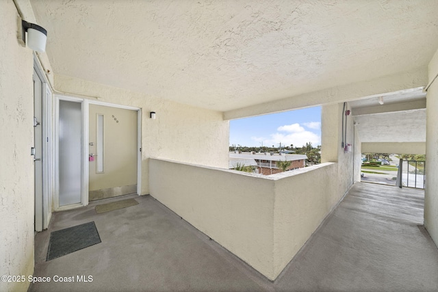 view of patio with a balcony