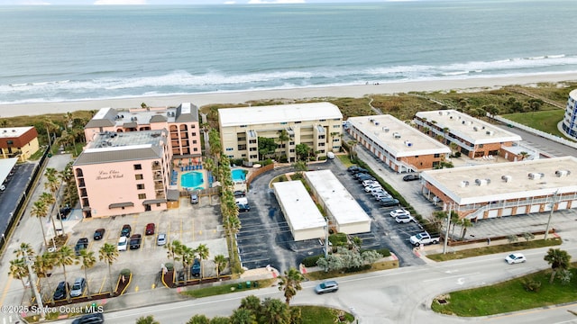 aerial view featuring a beach view and a water view