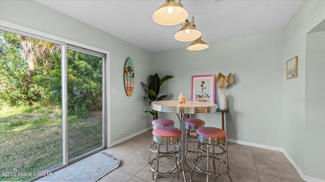 dining room featuring light tile patterned floors