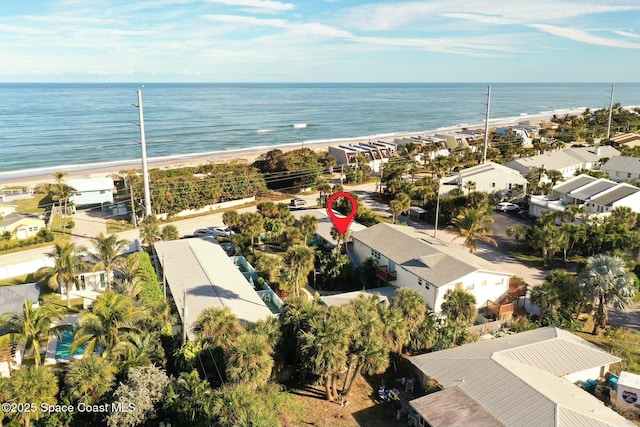 aerial view featuring a view of the beach and a water view