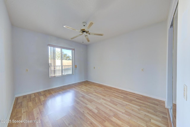 unfurnished room with ceiling fan and light wood-type flooring