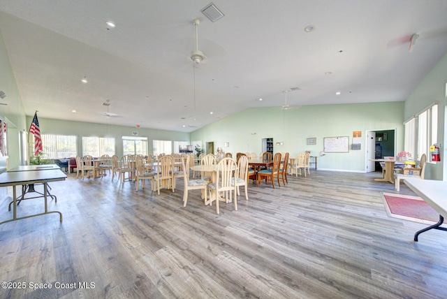 dining room featuring ceiling fan and light hardwood / wood-style flooring