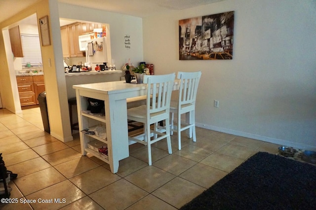 dining room featuring tile patterned floors