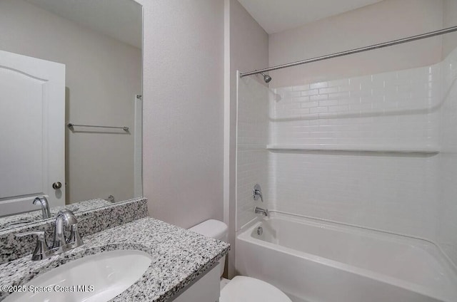 full bathroom featuring vanity, toilet, and shower / bath combination