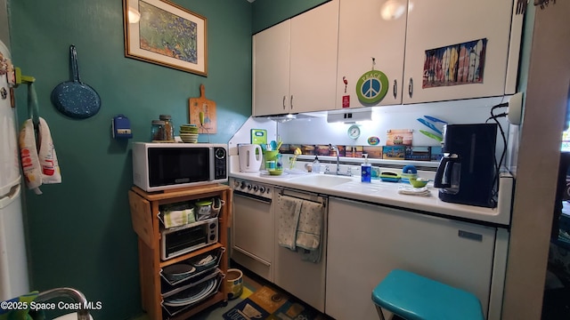 kitchen with sink and white cabinets