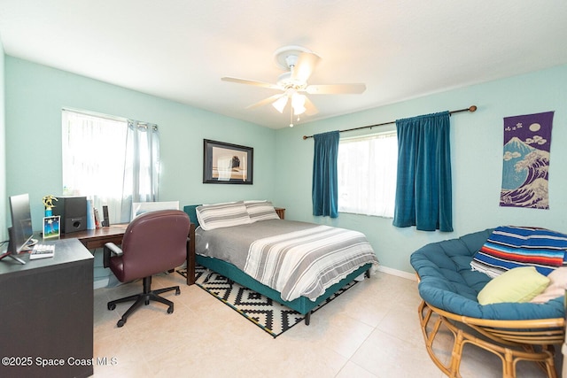 bedroom with light tile patterned floors and ceiling fan