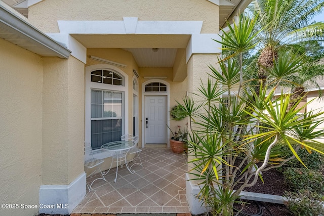 entrance to property with a patio area