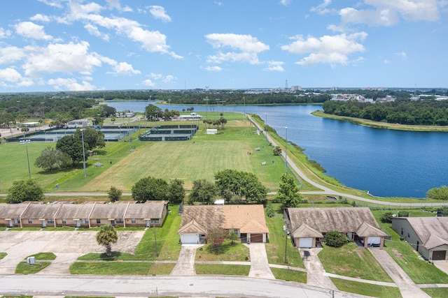 birds eye view of property featuring a water view