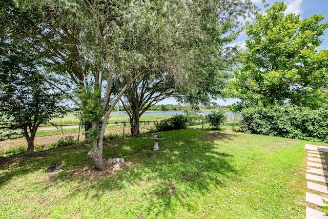 view of yard with a water view