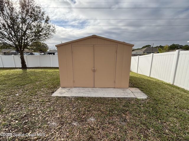 view of outdoor structure with a yard