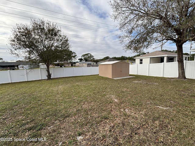 view of yard with a storage shed