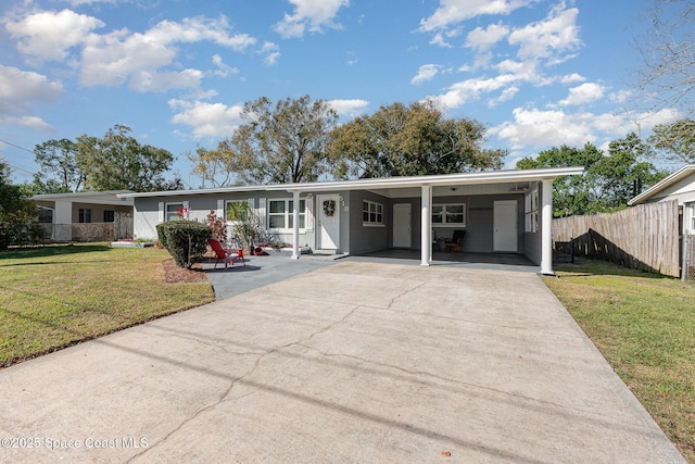 single story home with a carport and a front yard