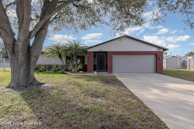 ranch-style home featuring a garage and a front yard