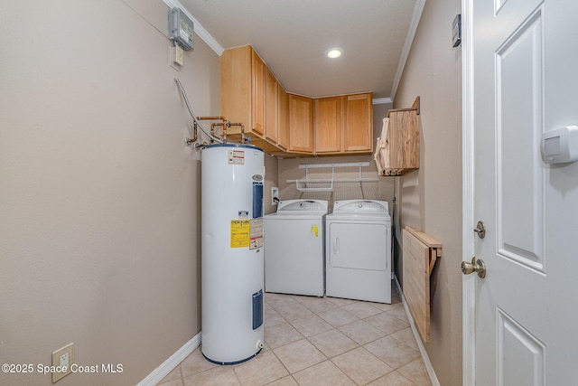 laundry room with light tile patterned floors, crown molding, water heater, cabinets, and washer and dryer