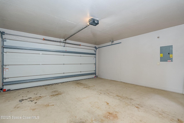 garage featuring a garage door opener and electric panel