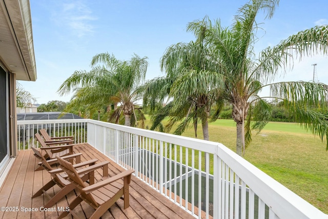 1459 Southpointe Ct, Melbourne, FL 32940 - wooden deck featuring a yard