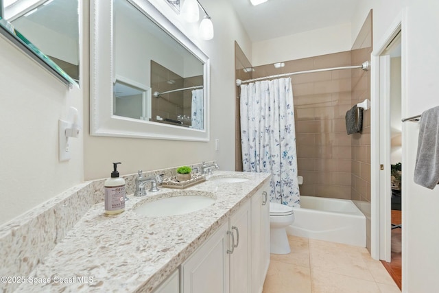 1459 Southpointe Ct, Melbourne, FL 32940 - bathroom with tile patterned floors, a sink, double vanity, and shower / bath combo with shower curtain