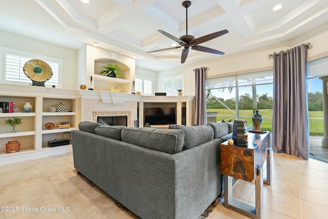 1459 Southpointe Ct, Melbourne, FL 32940 - living room with light tile patterned flooring, a fireplace, coffered ceiling, and a ceiling fan