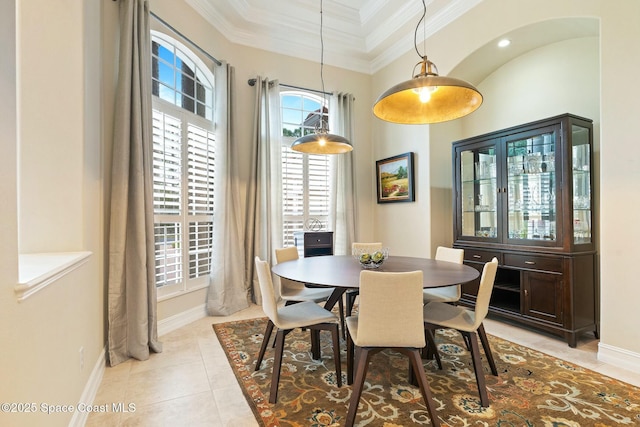 1459 Southpointe Ct, Melbourne, FL 32940 - dining room with baseboards, ornamental molding, and light tile patterned floors