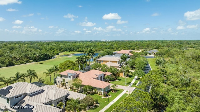 1459 Southpointe Ct, Melbourne, FL 32940 - bird's eye view featuring golf course view and a wooded view