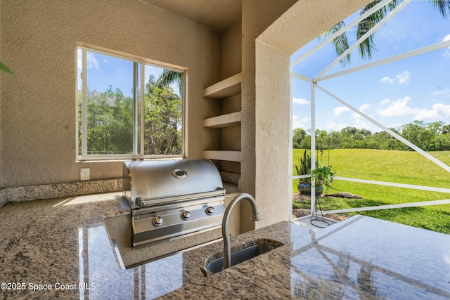 1459 Southpointe Ct, Melbourne, FL 32940 - view of patio / terrace with glass enclosure, a grill, a sink, and area for grilling
