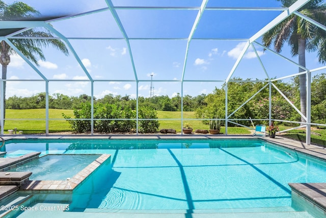 1459 Southpointe Ct, Melbourne, FL 32940 - view of pool featuring a lawn, a pool with connected hot tub, and a lanai