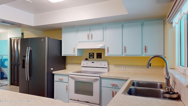 kitchen with blue cabinets, stainless steel fridge with ice dispenser, sink, and white range with electric cooktop