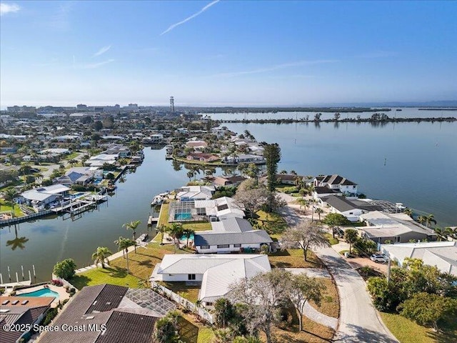 drone / aerial view with a water view