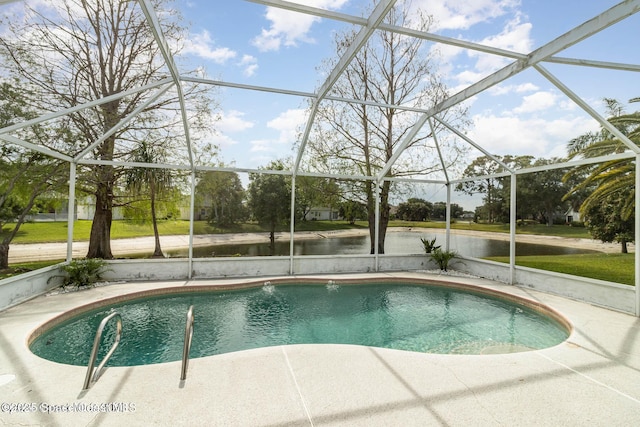 view of swimming pool with a patio, a water view, and glass enclosure