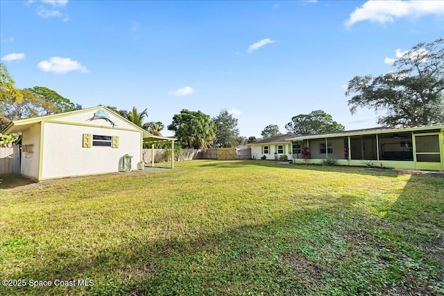 view of yard with a sunroom