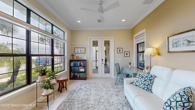 living room with crown molding, ceiling fan, recessed lighting, french doors, and tile patterned floors